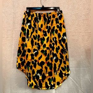 Colorful, Leopard print skirt, asymmetrical cut.